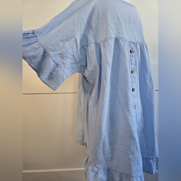 Light Blue Ruffle Hem Top With Button Detail Down The Black - Picture 10 of 10